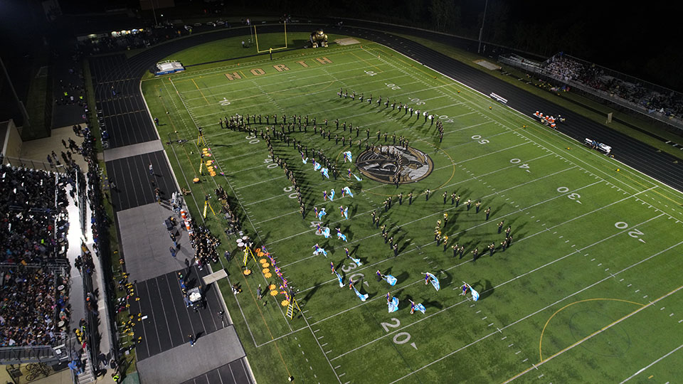 The yearbook’s new drone captured this photo of the band at a football game. The band’s theme is Evolution of the Machine.