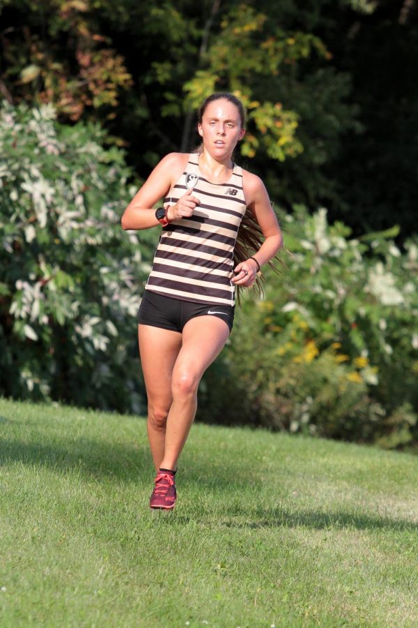 Kelli Tosic is a State qualifying cross country runner.