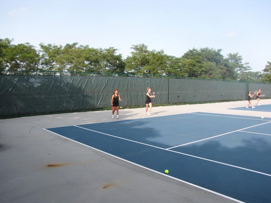 The girls tennis team competes at home against Wauconda High School on September 17, 2020.