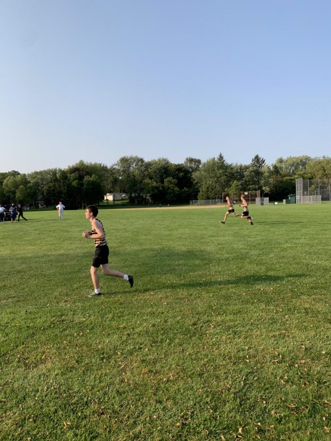 Members of the boys cross country team compete against Wauconda High School
