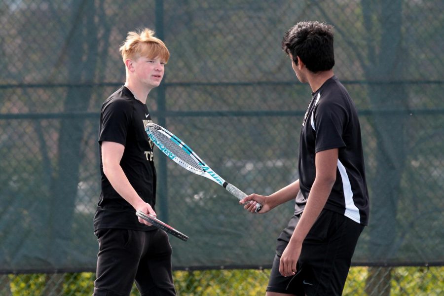The boys tennis team began the season with a record of 2-1 in conference play.