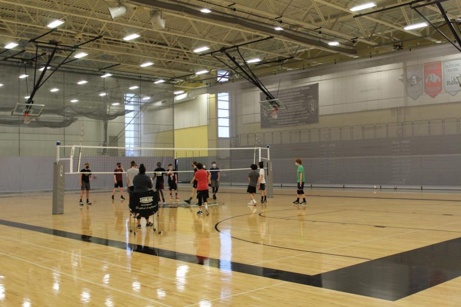Members of the boys volleyball team practice for their games this season.