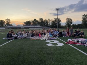 Seniors meet on the football field on the first Friday of the school year to view the sunrise and be together.
