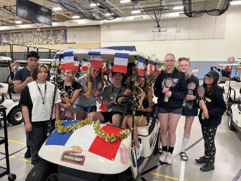 French Club gets ready for golf cart parade.