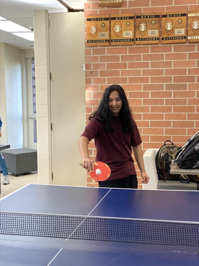 Roman Hernandez plays table tennis with the club. The table tennis club meets every Wednesday after school