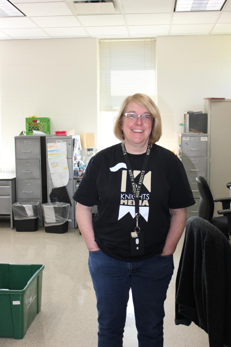 Ms. Nielson posing for a picture in her office just a few weeks away from retiring from Grayslake North