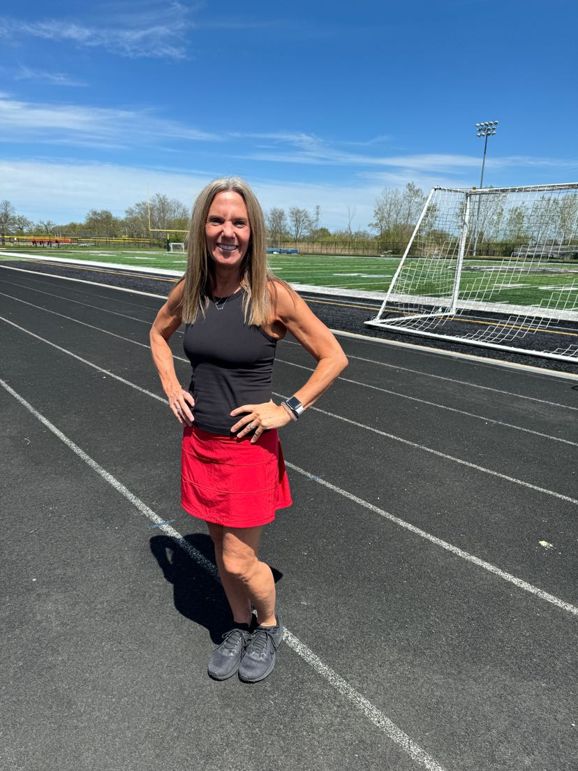 Ms. Williams posing for a picture while taking the integrated P.E. class outside for a choice day. The students had lots of fun as they got to choose what activity to do.